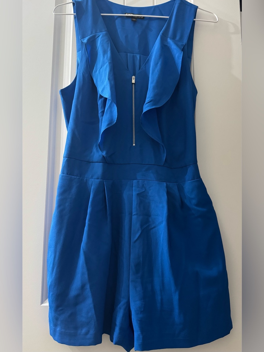 EXP Ruffle Romper w/Front Zip
Vibrant Blue Sleeveless